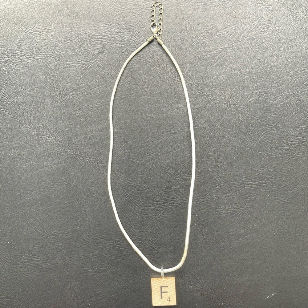 Casual necklace with wooden pendant featuring “F” great for families and friends